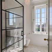 Bathroom window shutter installation in Southwold